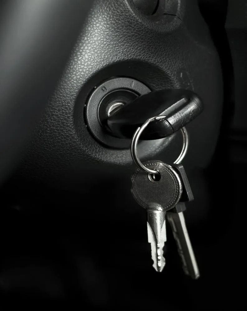 Car Ignition With Key Inserted, and Two Additional Keys Hanging — Shaine Hunter Locksmiths in Mount Isa City, QLD