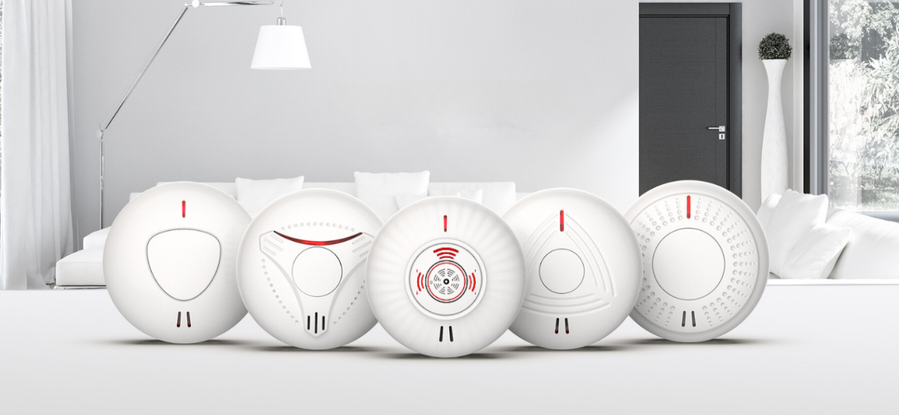 a row of smoke and heat alarms that can be wirelessly interlinked