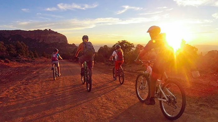 moab adventure center biking-canyon sunrise-sunflare