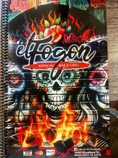 Menu cover for El Fogon Mexican Bar & Grill, featuring sugar skulls over flames and colorful floral accents.