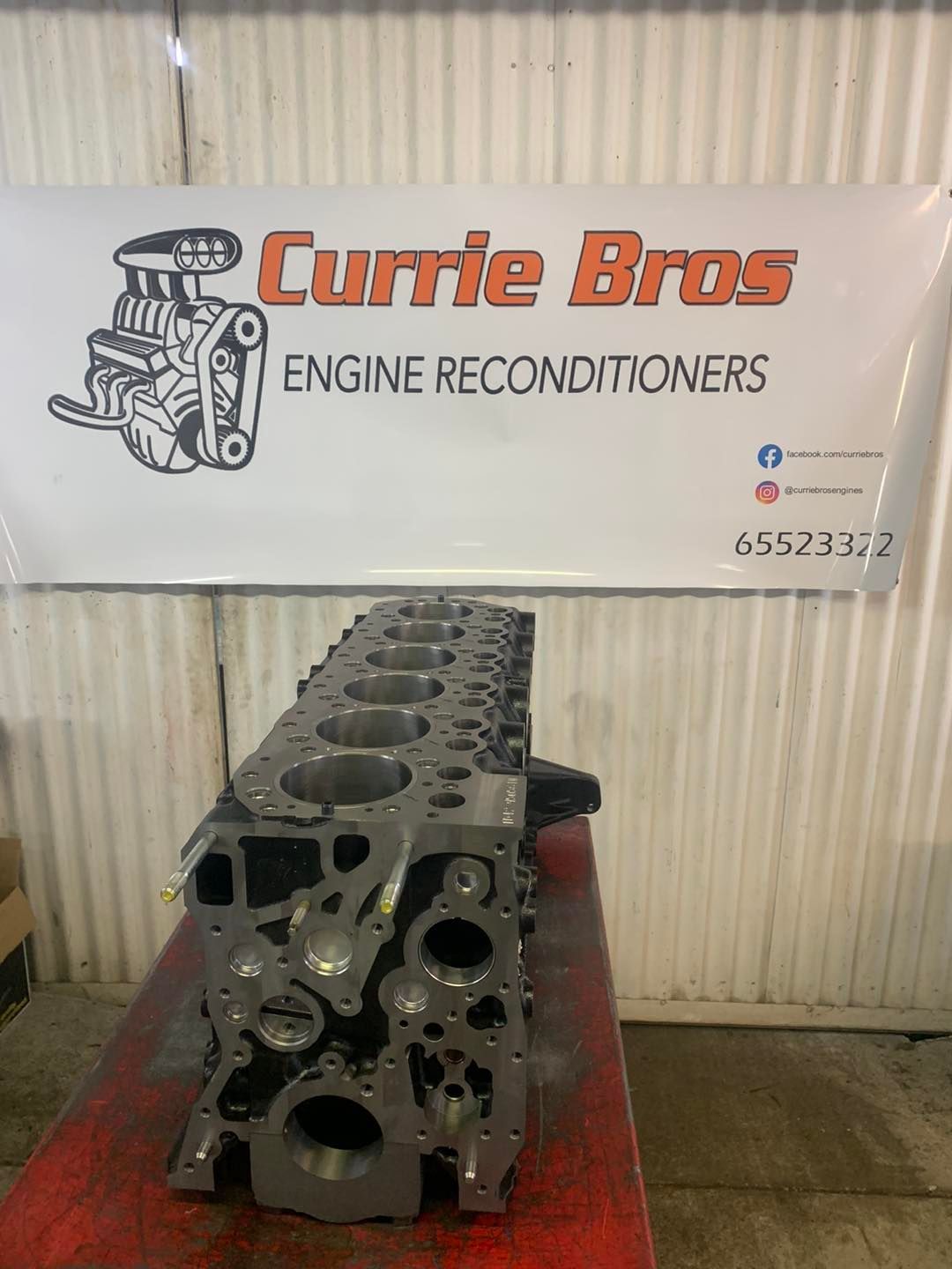 A Cylinder Head is Sitting on a Table — Currie Bros Engine Reconditioners in Taree, NSW