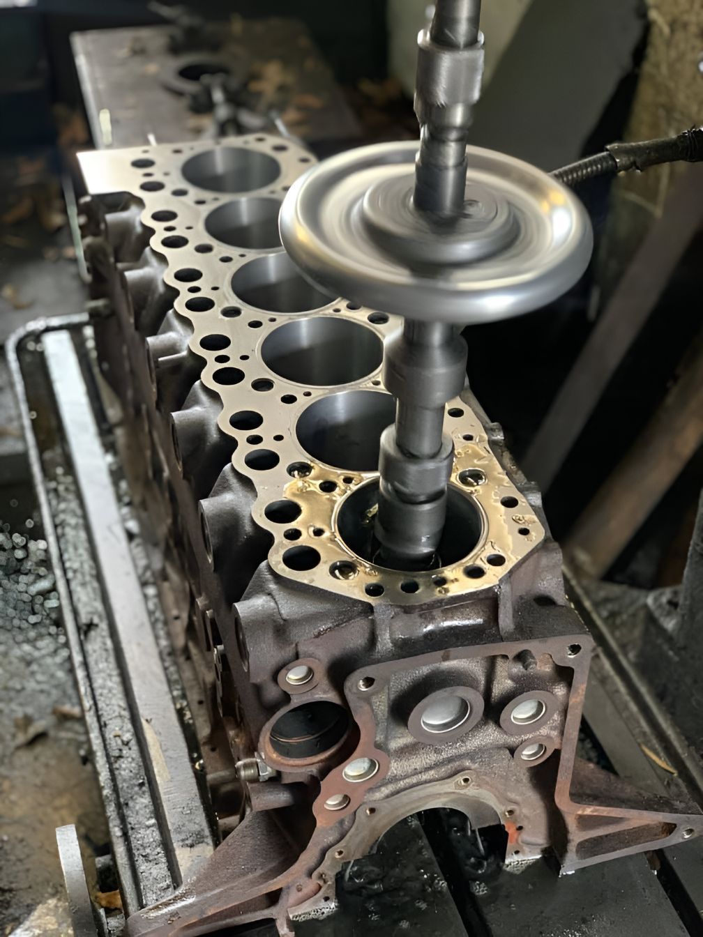 A Cylinder Block is Being Worked on by a Machine — Currie Bros Engine Reconditioners in Wauchope, NSW