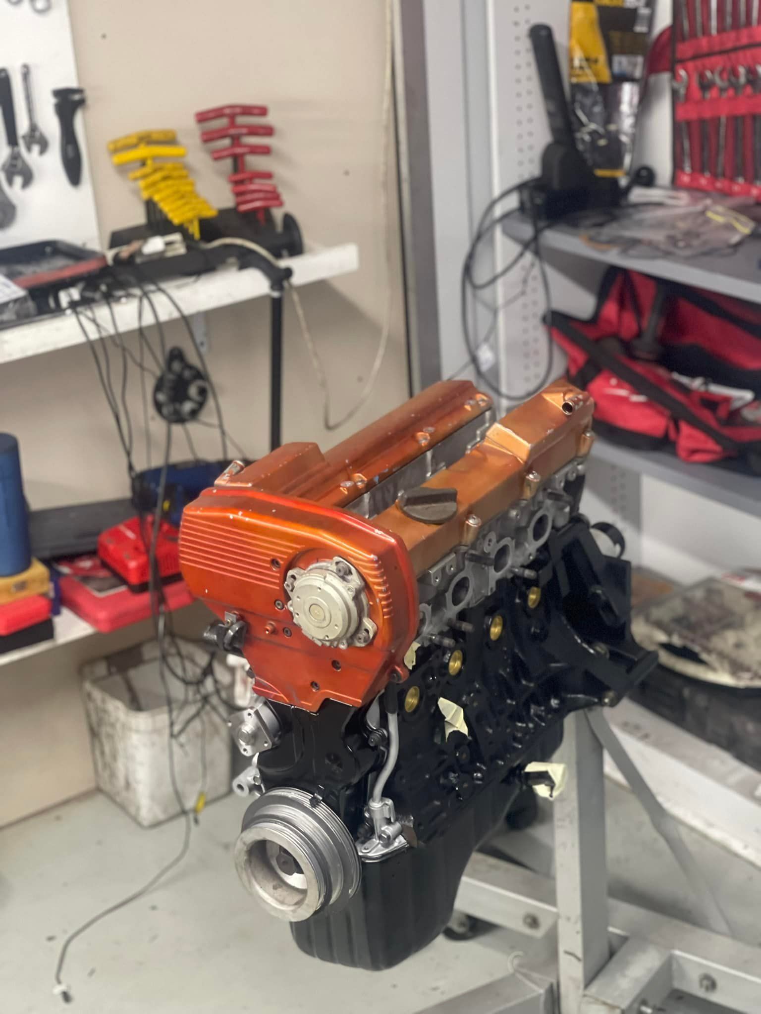 Orange Vehicle Engine — Currie Bros Engine Reconditioners in Taree, NSW