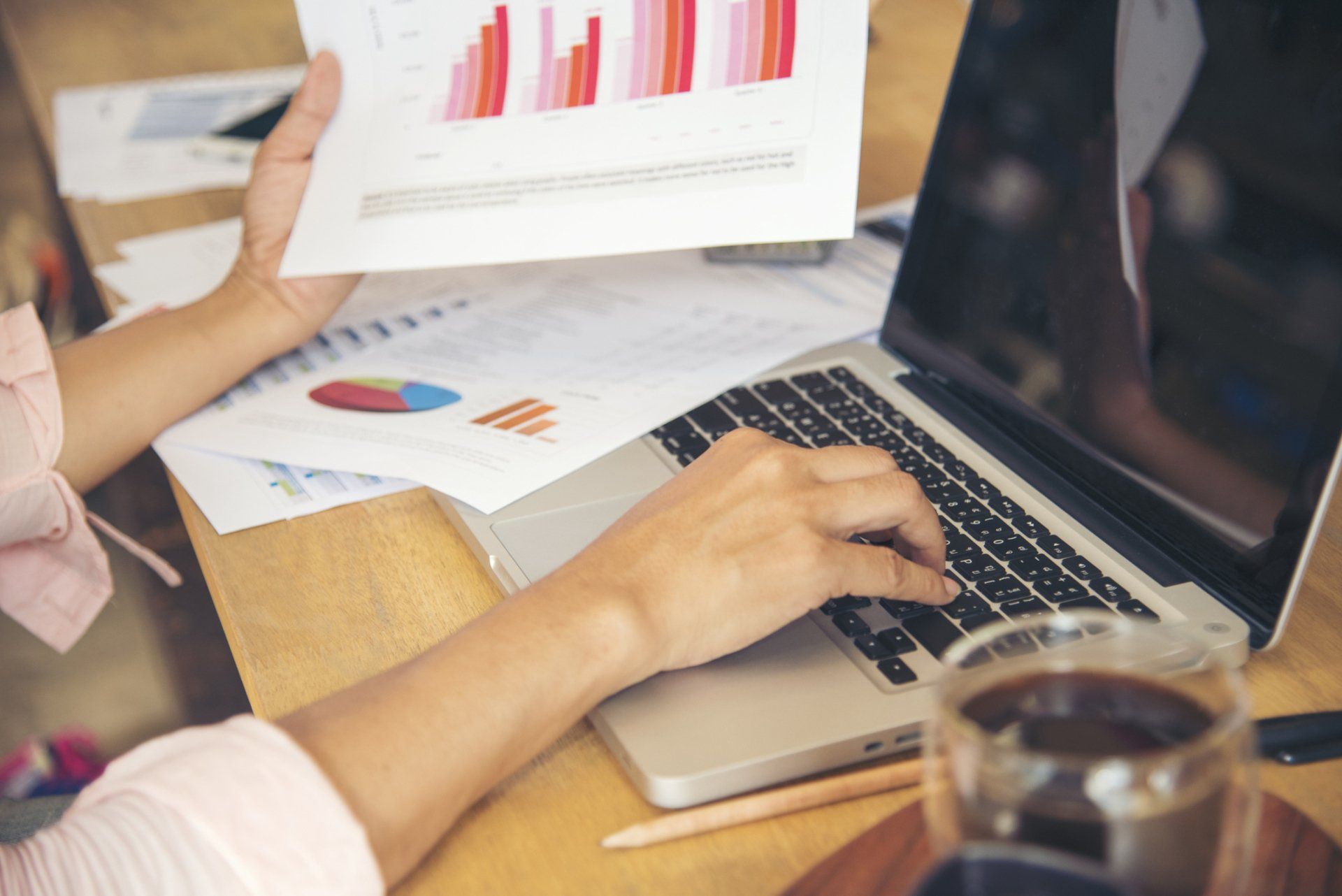 Woman Working on Office Desk – Salt Lake City, UT – Hypnoscure LLC