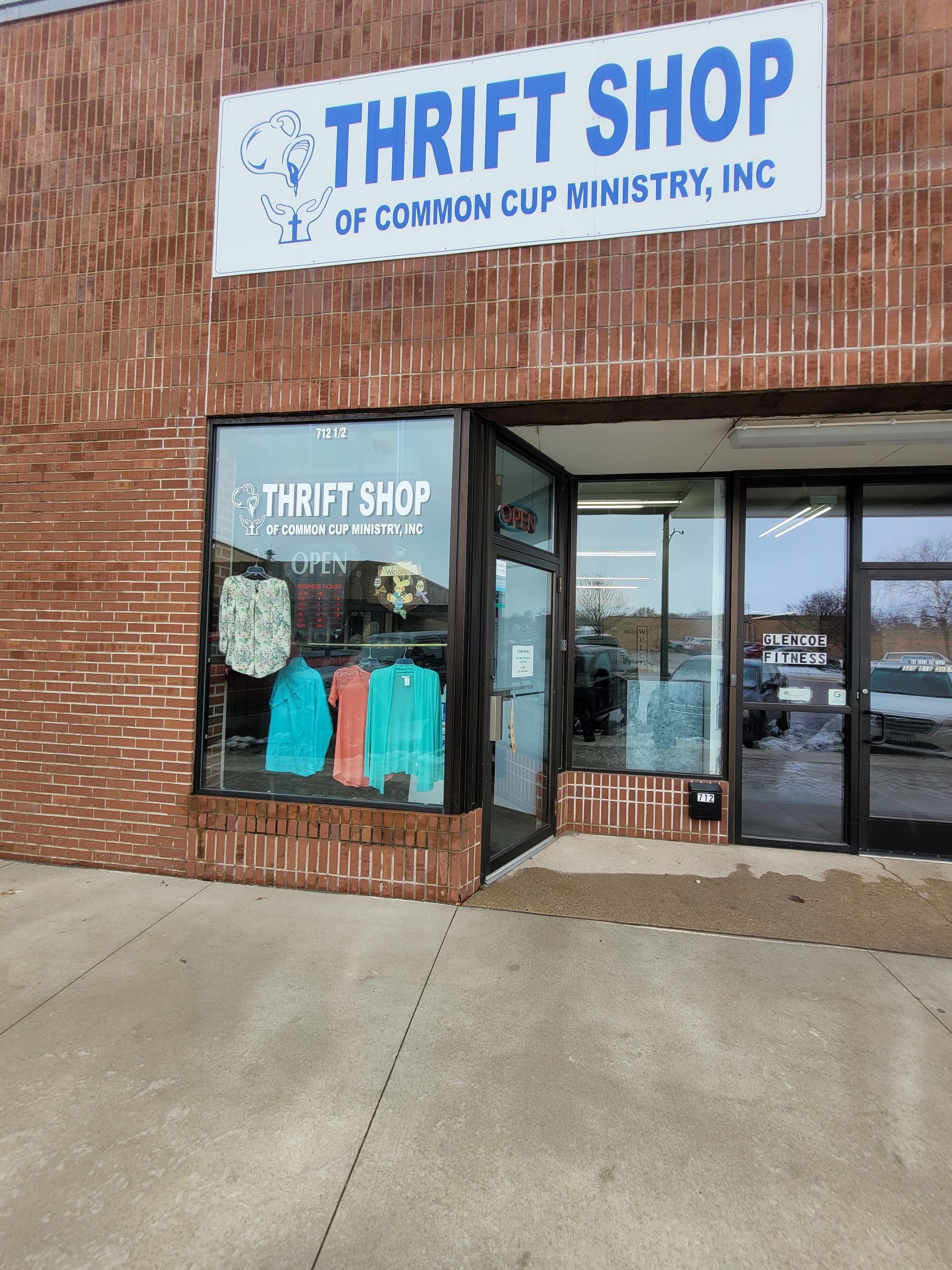 A thrift shop is located in a brick building