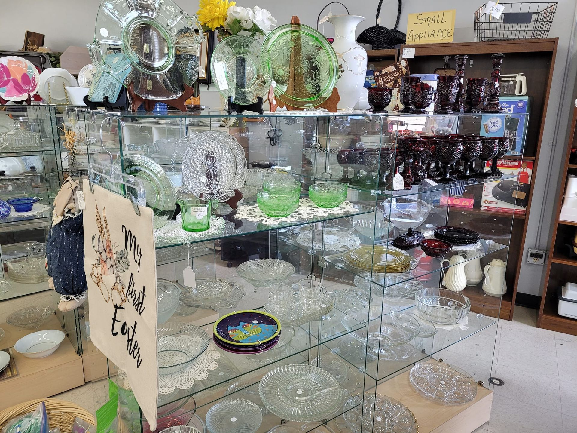 A store filled with lots of glassware and plates.