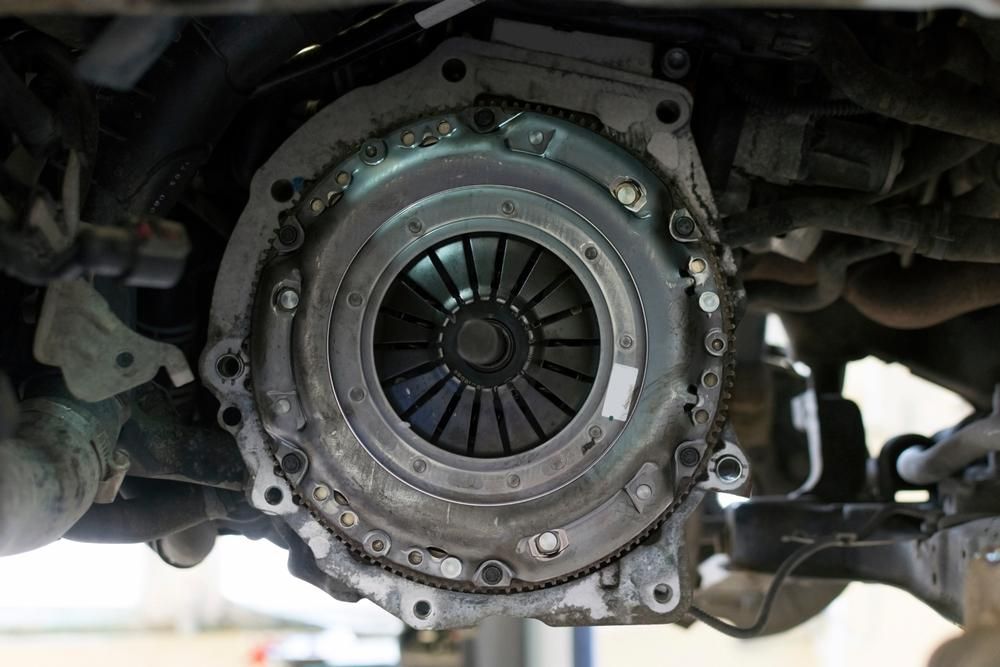 A Close Up Of A Clutch On The Underside Of A Car — Cairns Caravan Repairs In Edmonton, QLD