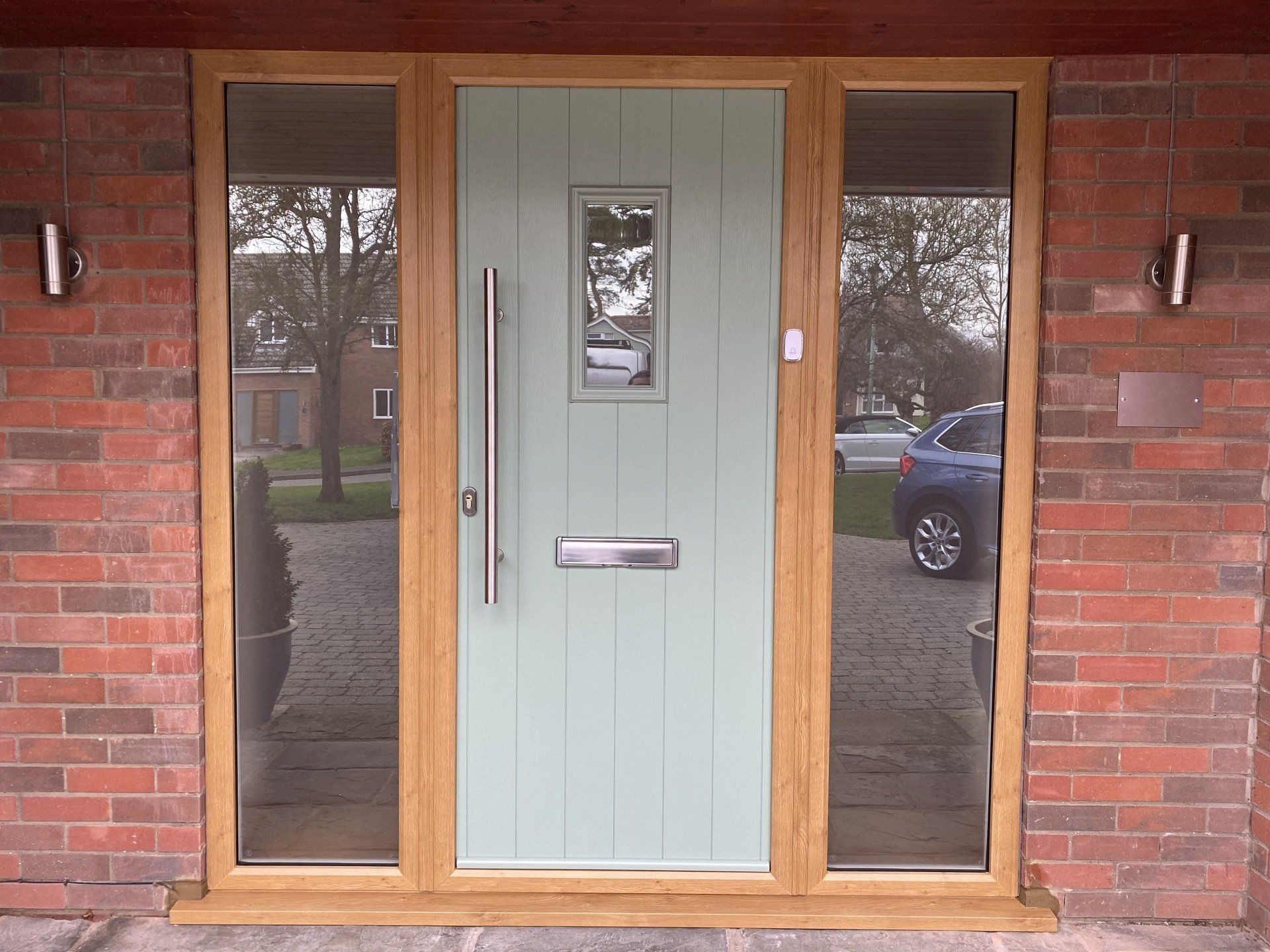 Light grey/ green door on house