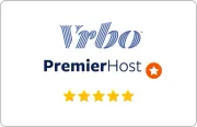 Vrbo PremierHost badge with five gold stars on a white background