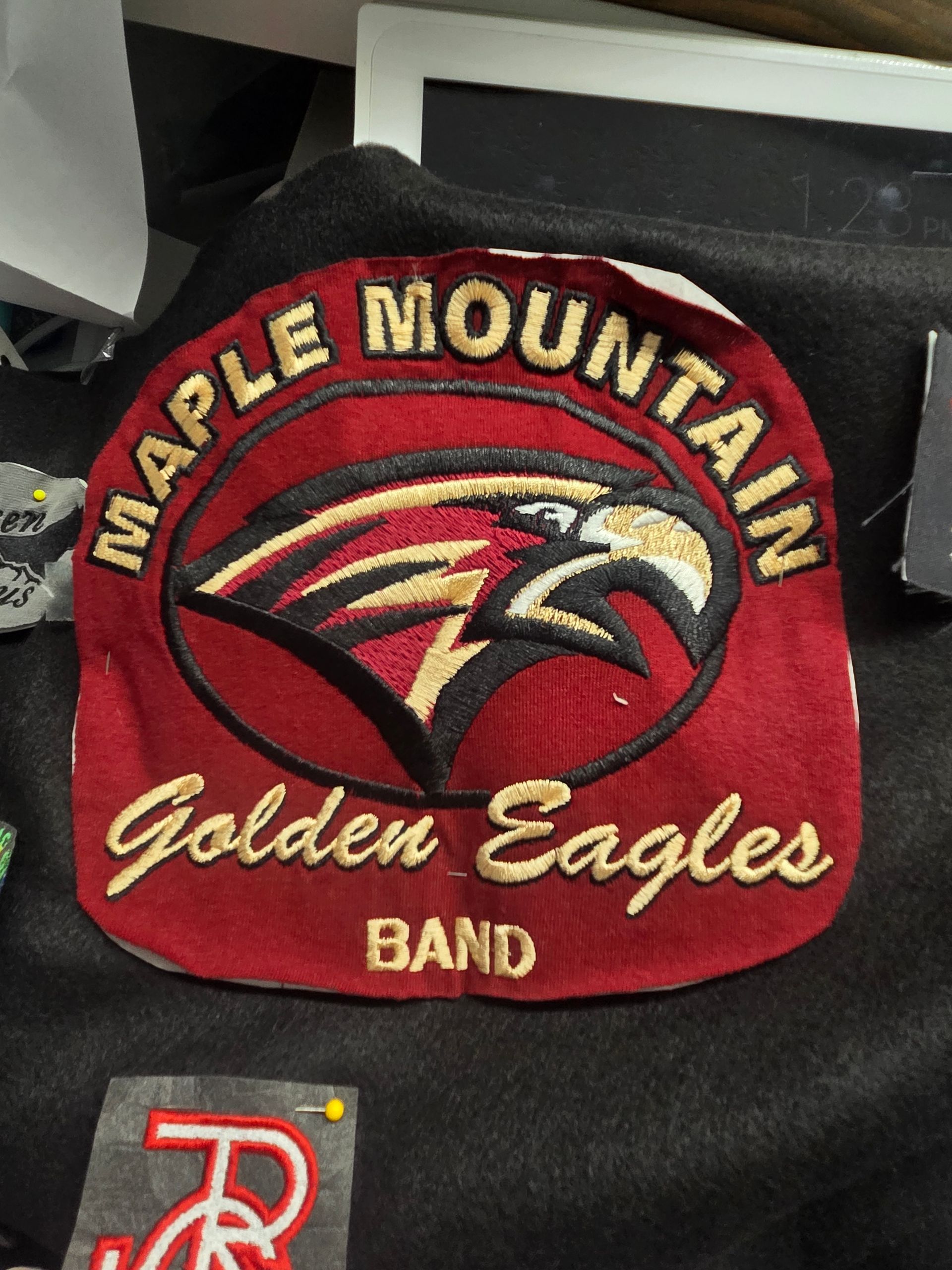 Maple Mountain Golden Eagles Band patch with a red eagle.