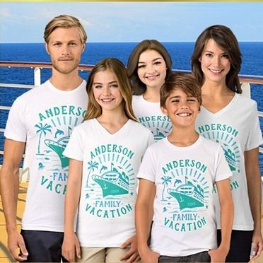 A group of people wearing matching family vacation shirts