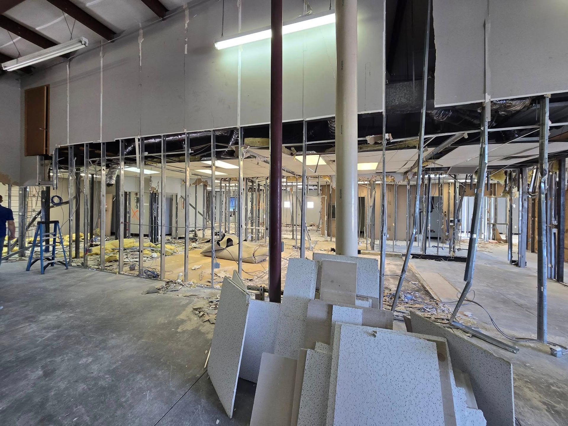 A large building under construction with a lot of walls and pillars.