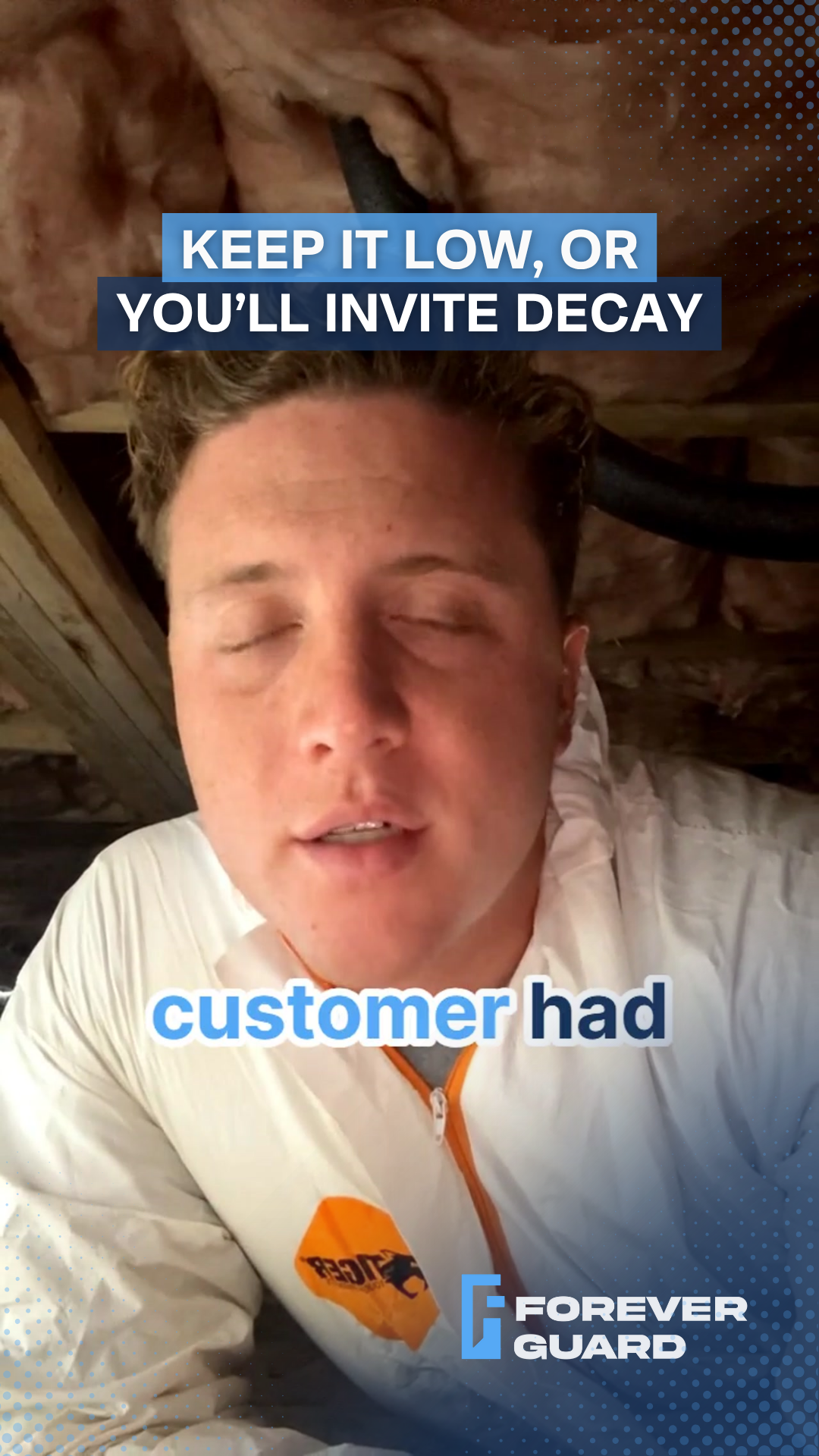 Man in white suit in an attic, text: