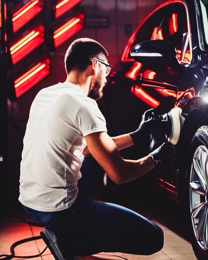 Skilled Panel Beater Restoring Classic Black Car — Old School Custom And Collision in Fawkner, VIC