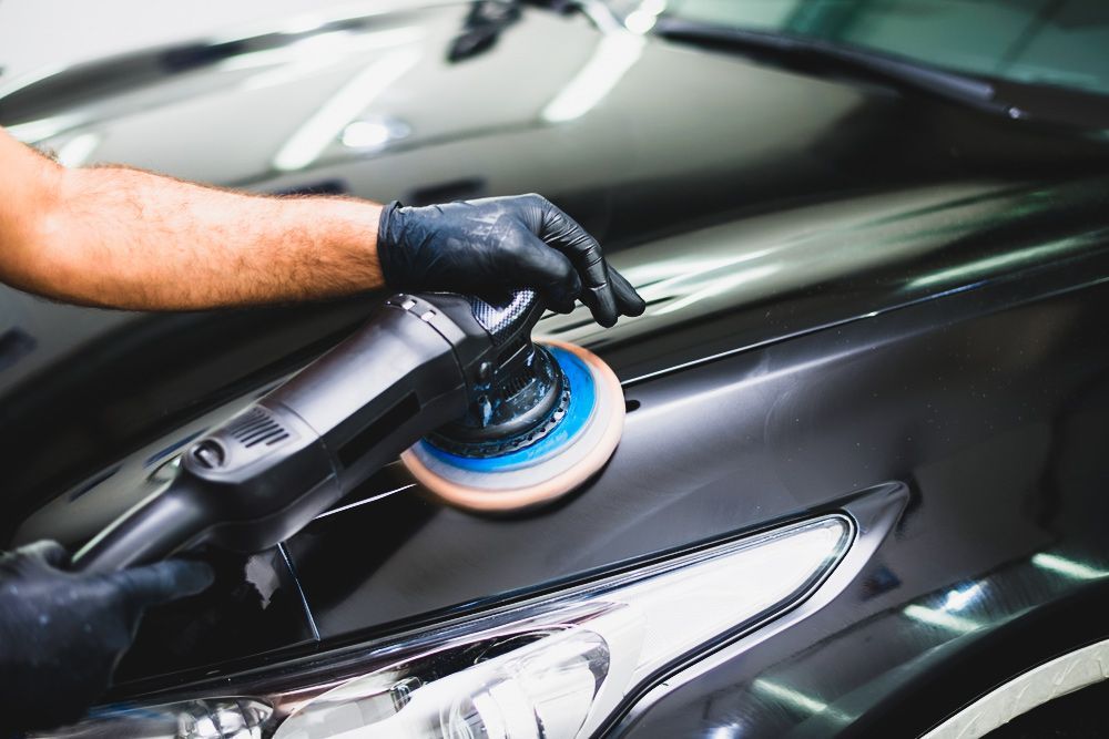 Skilful Panel Beating of a Classic Black Car Bonnet — Old School Custom And Collision in Fawkner, VIC