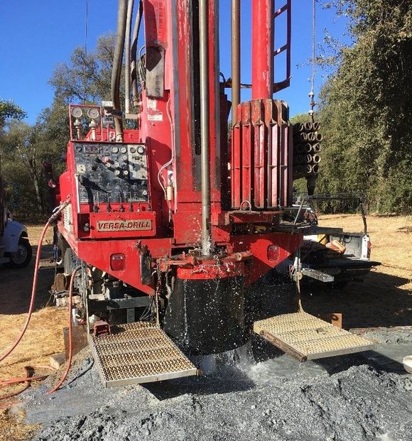Pump Installation — Red Truck with Drill in Newcastle, CA