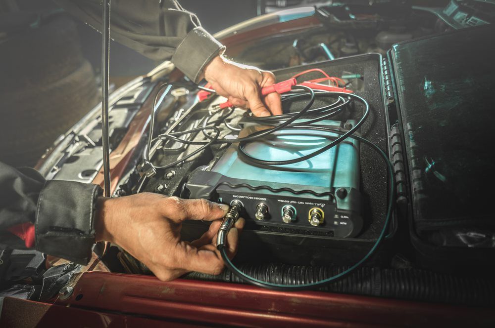 Mechanic Using Car Diagnostic Machine - Mechanic in Bundaberg East, QLD