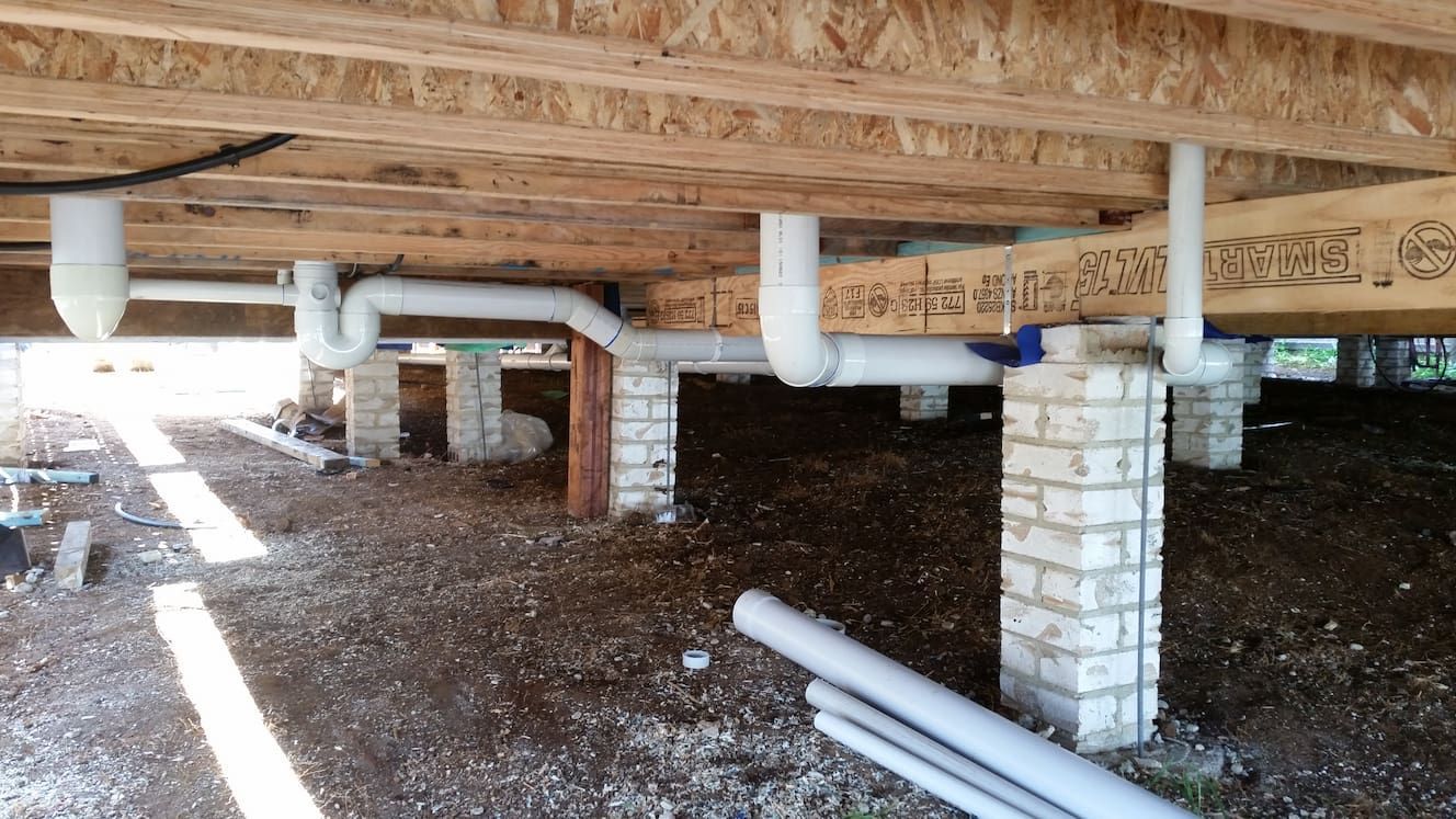 Plumbing Underneath A House — Grant Wannan Plumbing in Wollongbar, NSW