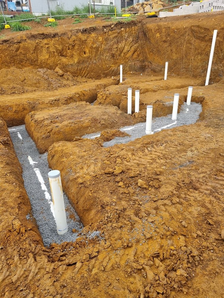 A Person Is Fixing a Sink Pipe with A Pair of Pliers — Grant Wannan Plumbing in Alstonville, NSW