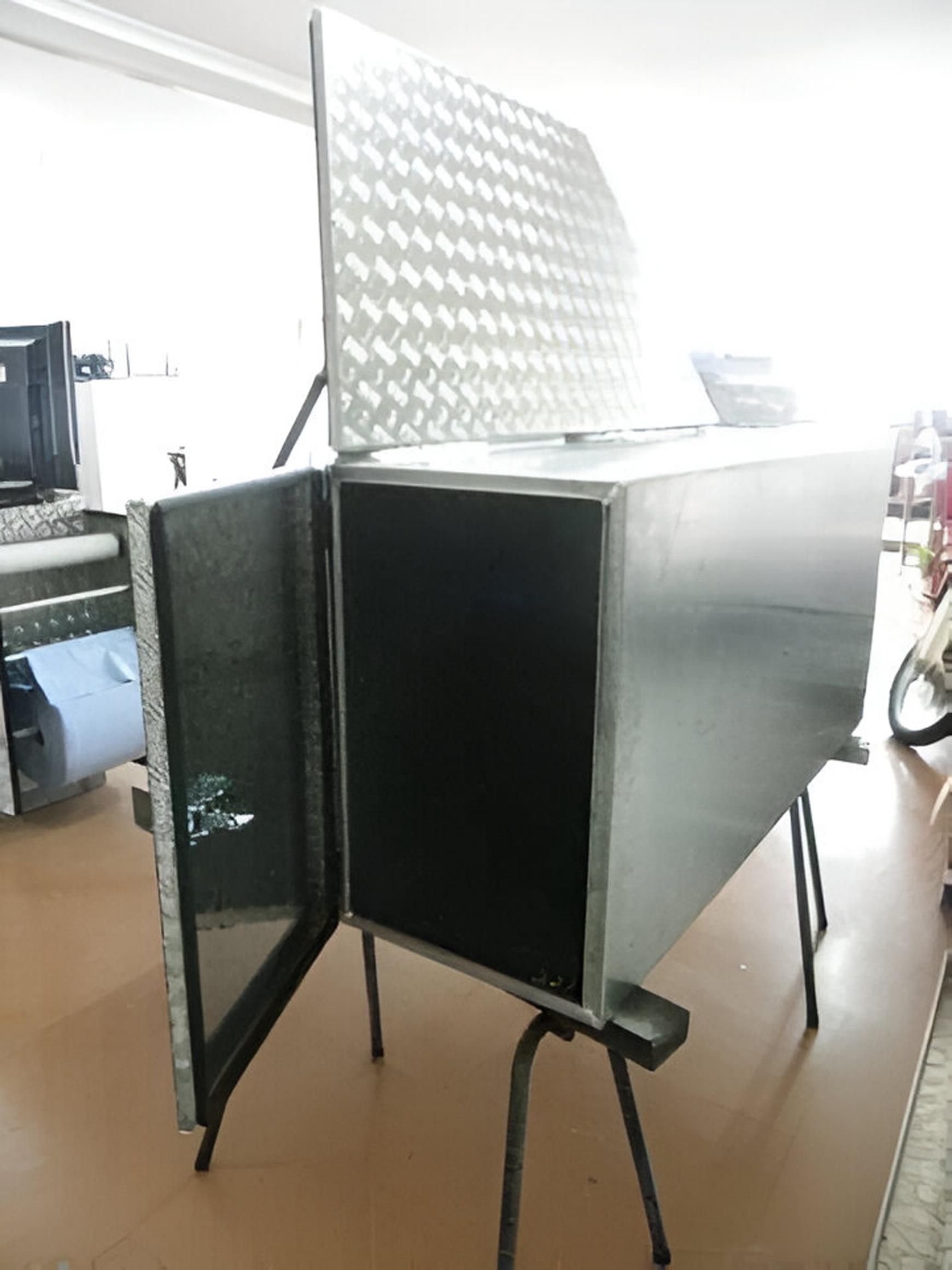 A Metal Box With the Door Open is Sitting on a Table — Eclipse Fabrication in Atherton, QLD