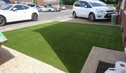 artificial grass in parking area