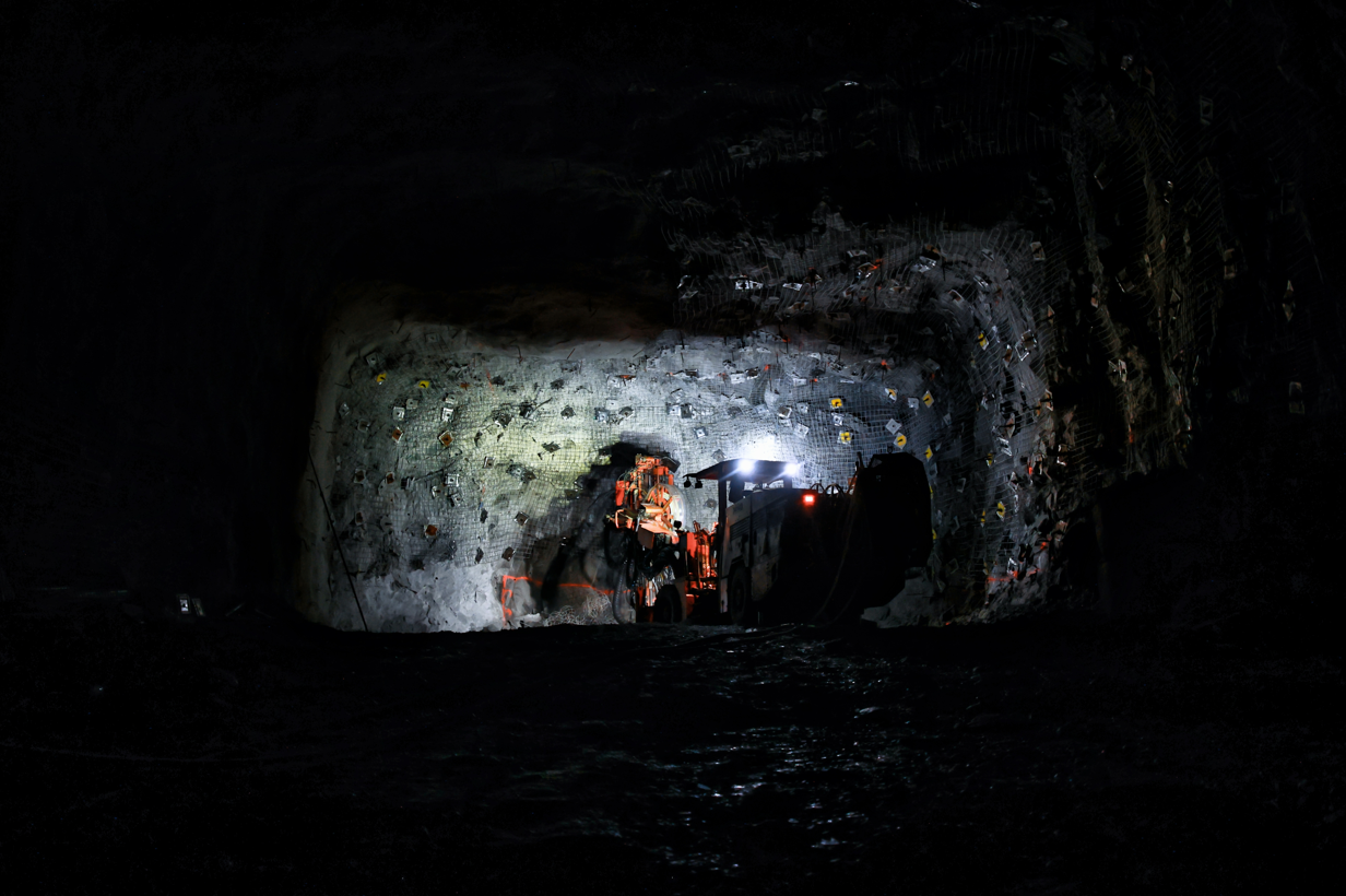 Well Uniformed Miner with Mining Vehicle Equipment — Secure Mine Solutions In Ryan, QLD
