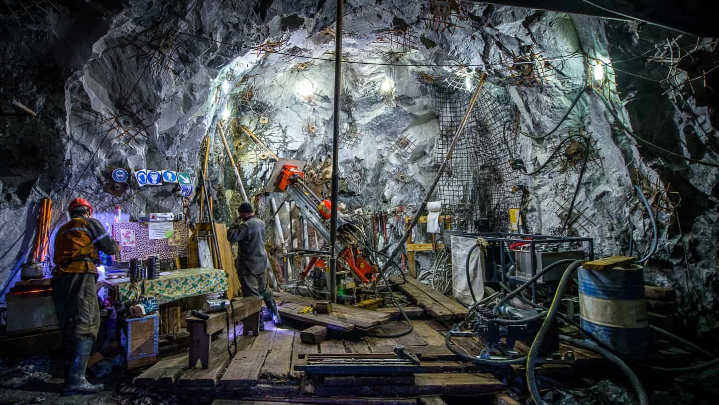 A Group of People Are Working in a Cave — Secure Mine Solutions In Ryan, QLD