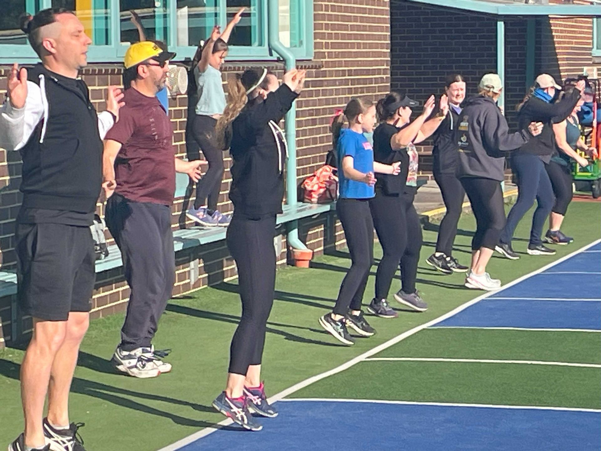 Members completing their pre obstacle warmup