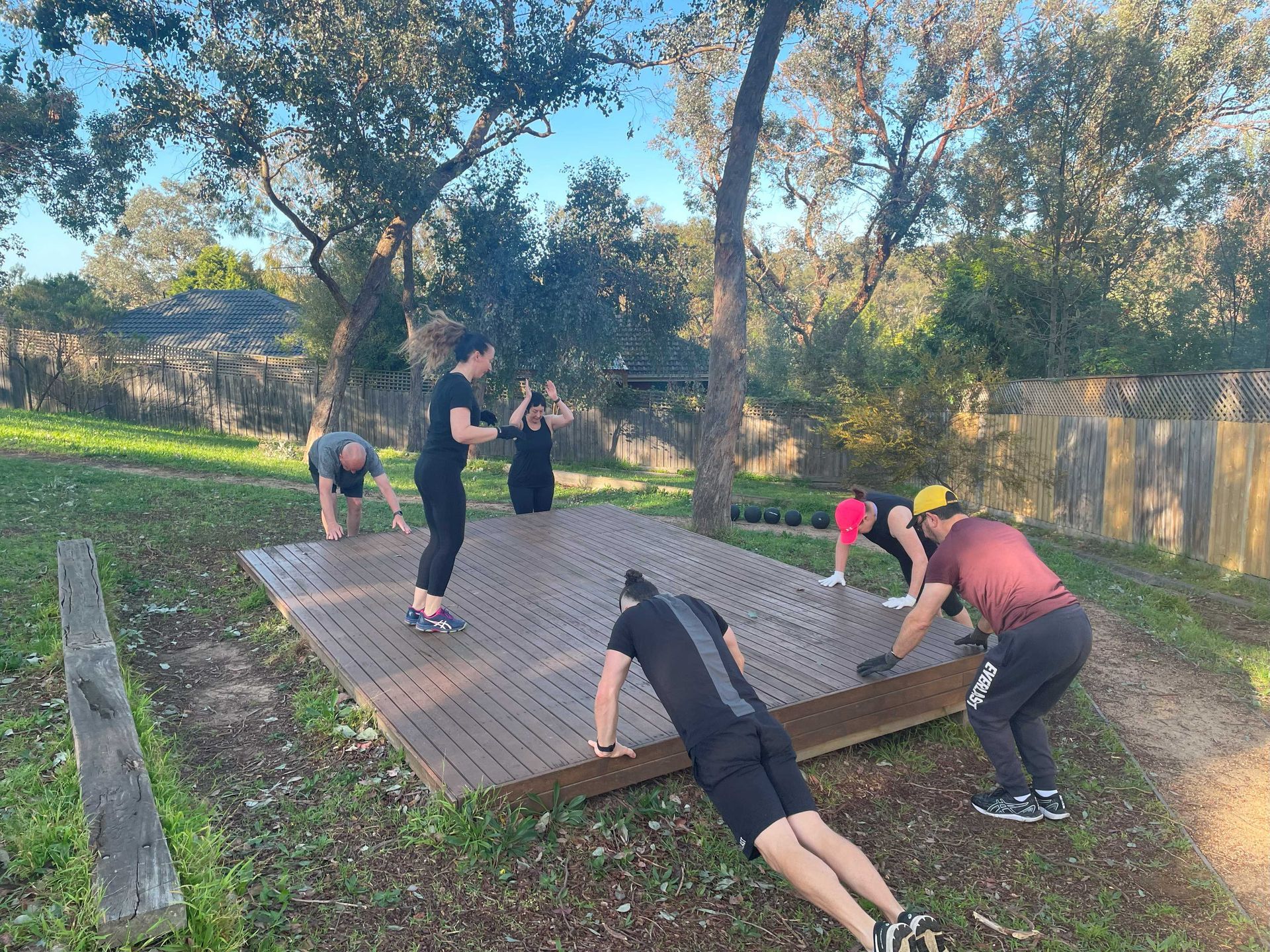Members doing burpees