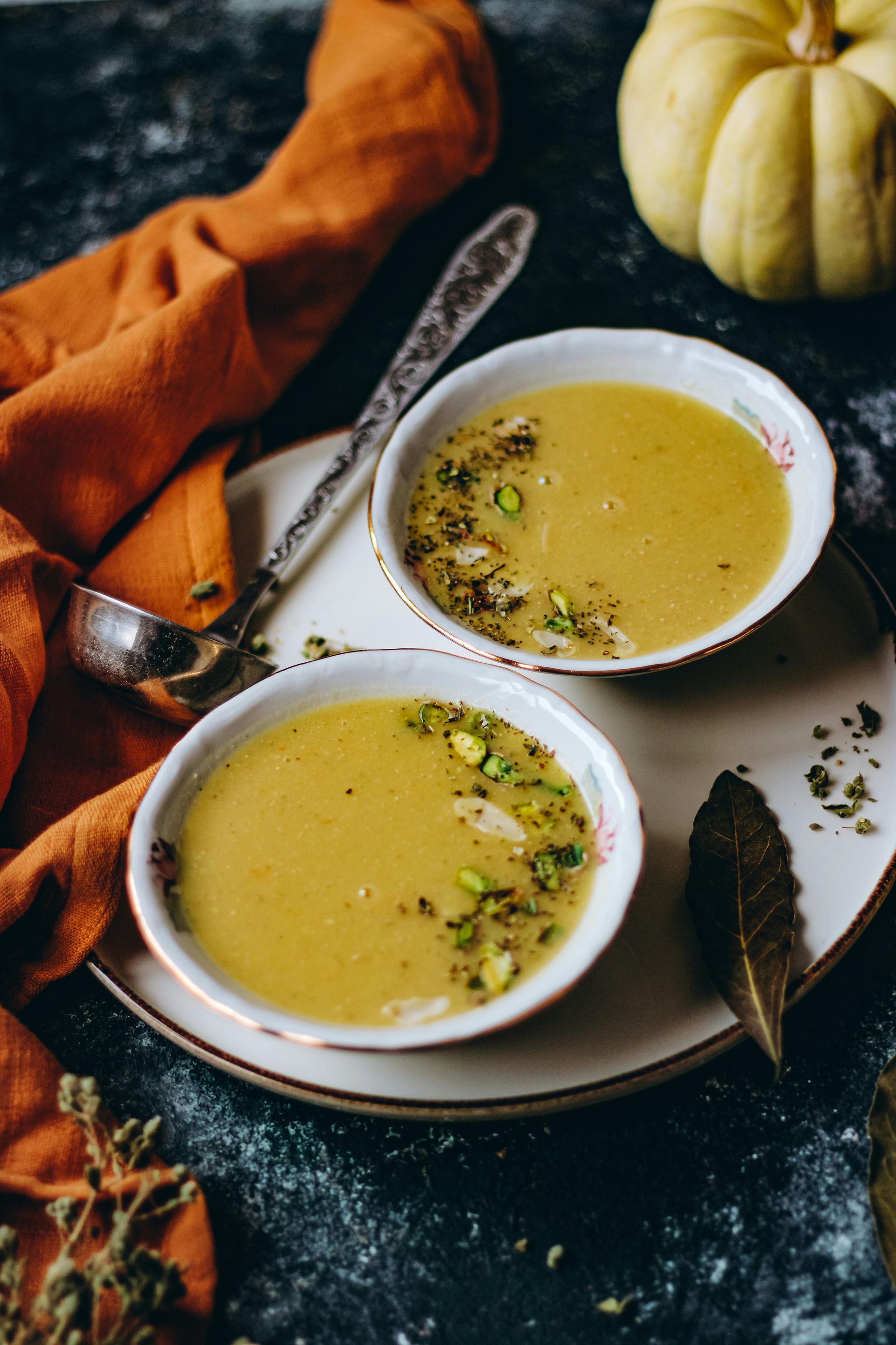 Two bowls of steaming hot soup