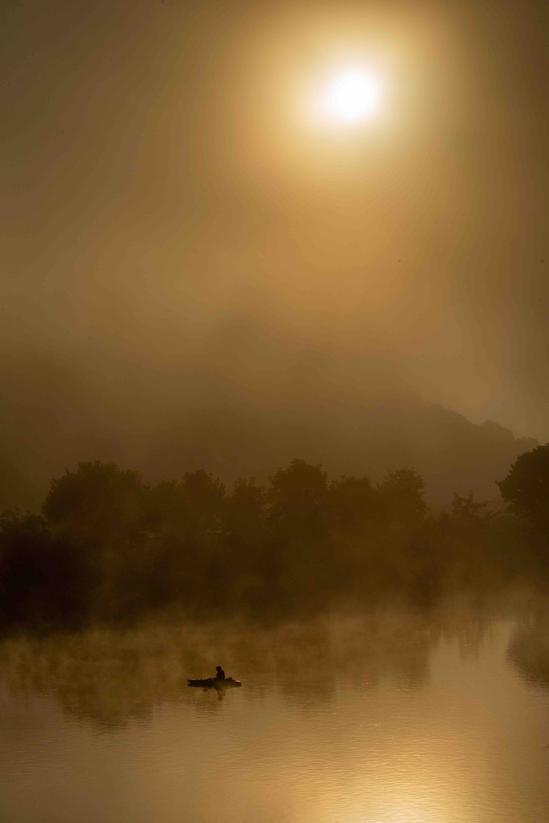 Sunrise over a loch.