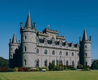 Exterior of Inveraray Castle in sunshine.