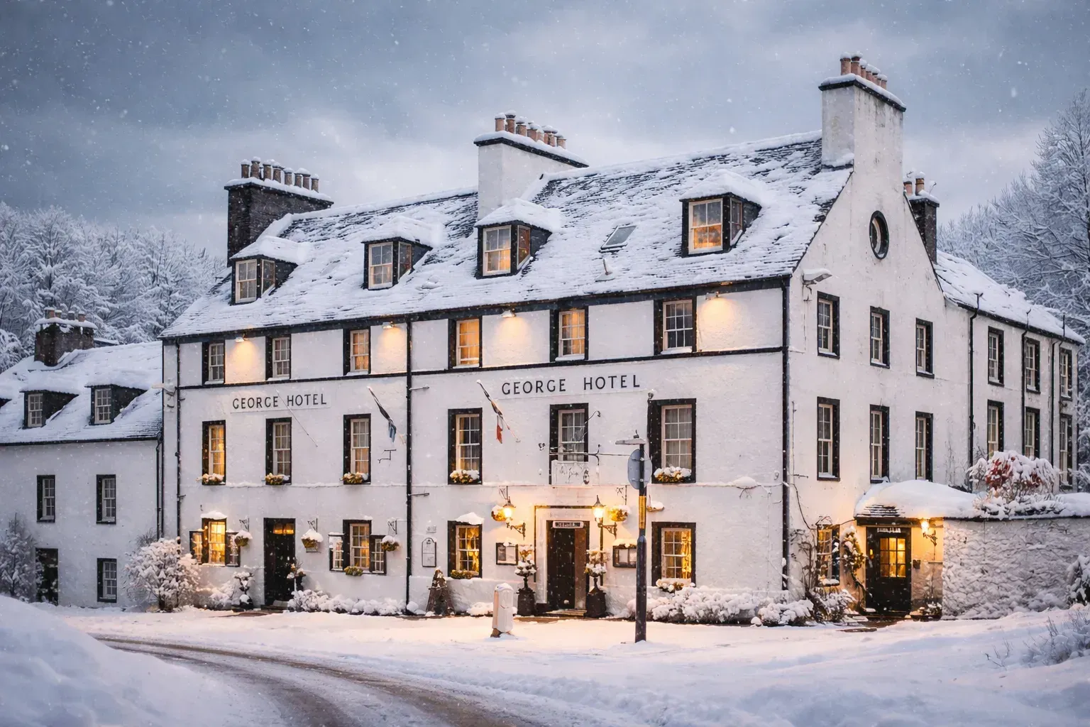 The historic George Hotel in Inveraray covered in snow, a famous local pub and restaurant a short drive from Kabn.
