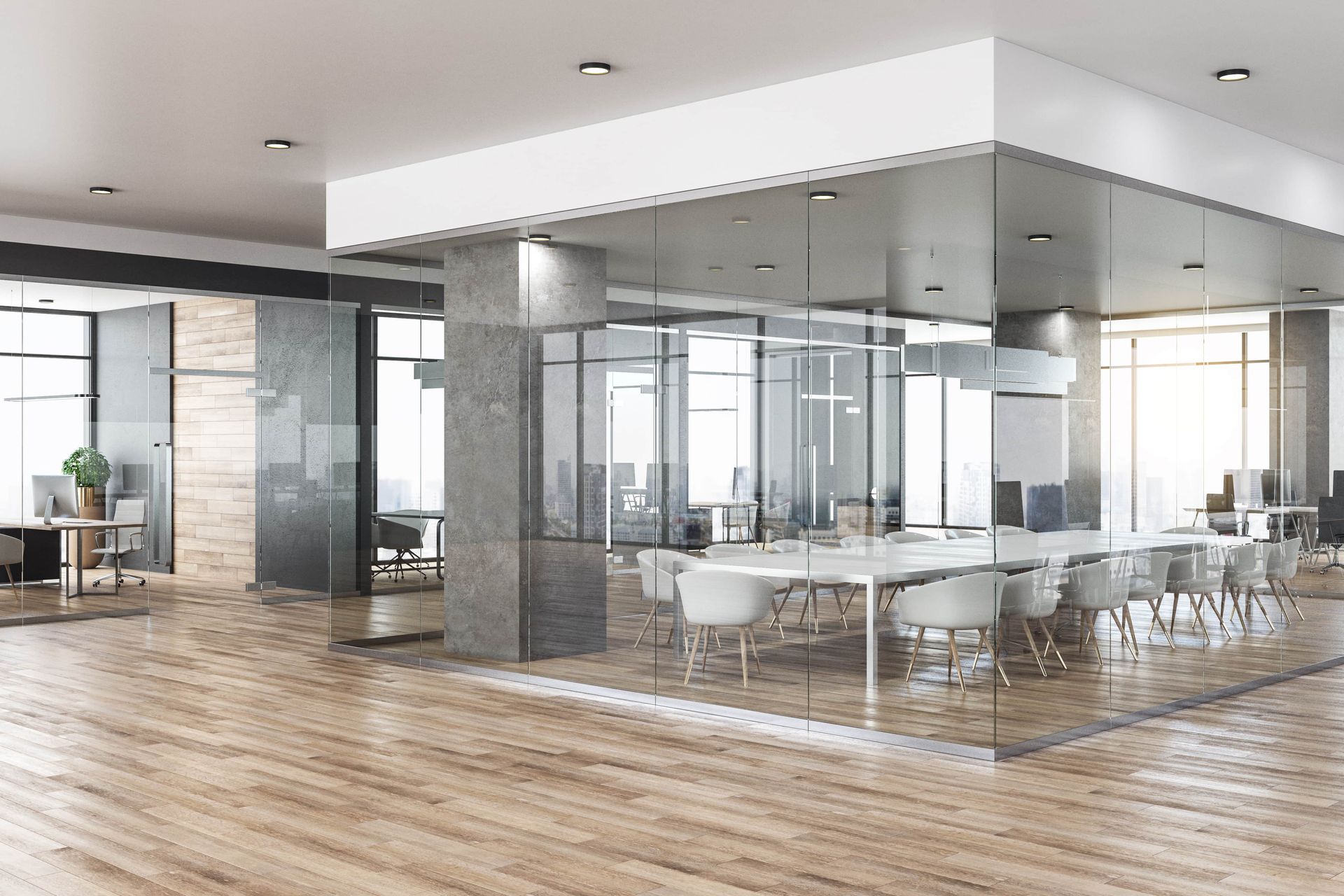 Modern office space with glass-walled conference room, wood floors, and open workstations.