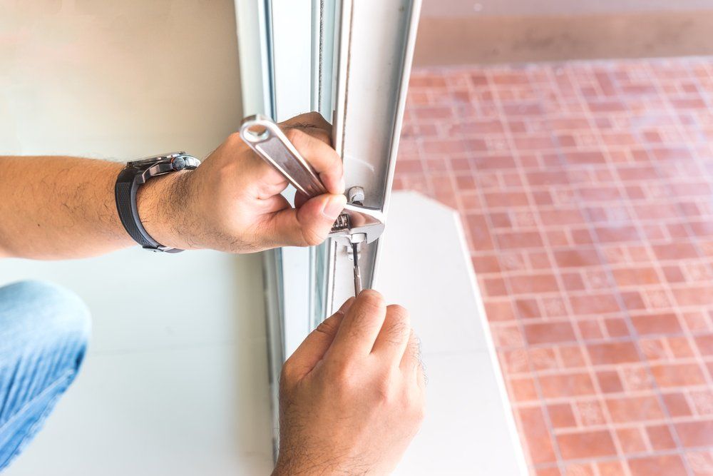 Locksmith Try to Repair Old Slide Door — CTS Locksmiths in Sunshine Coast, QLD