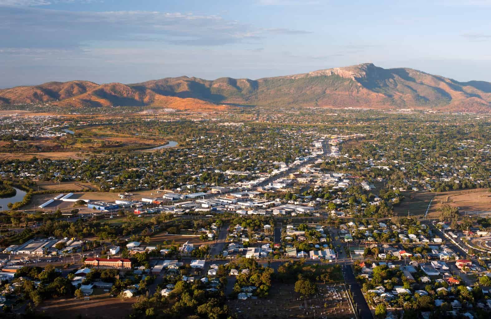 An Aerial View of a City With Mountains — CTS Locksmiths in Aura, QLD