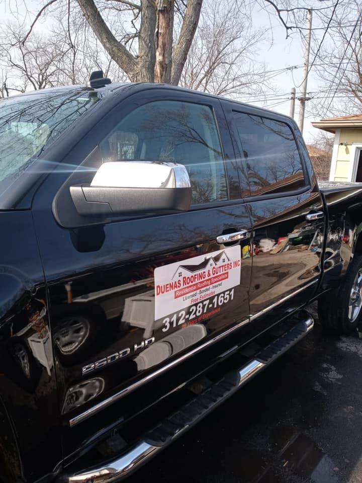 Black Pickup Truck — Markham, IL — Duenas Roofing & Gutters Inc