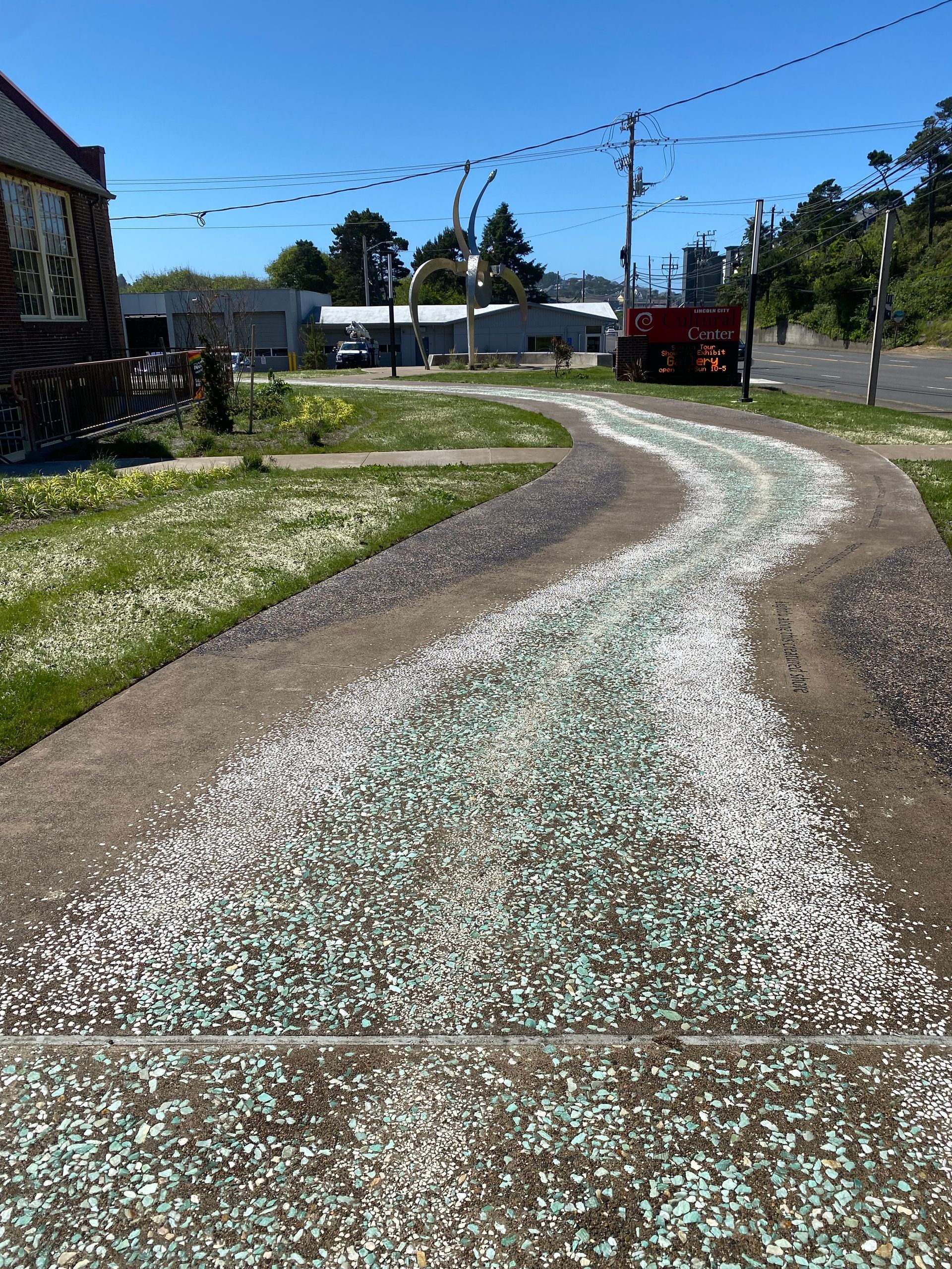 A road with a lot of white gravel on it