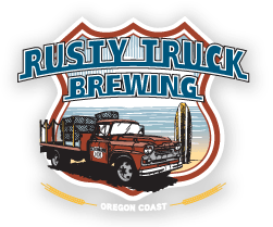 A logo for rusty truck brewing in oregon coast