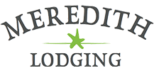 The logo for meredith lodging has a green star on it.