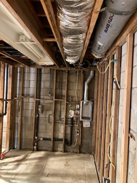 A room with a lot of pipes hanging from the ceiling in Huntington Beach, CA