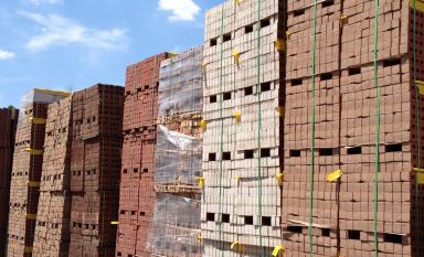 Pallets of bricks stacked up
