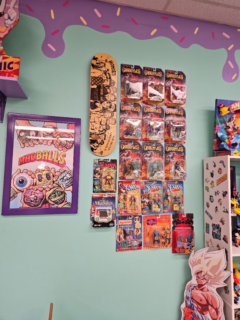A room with a lot of toys on the wall