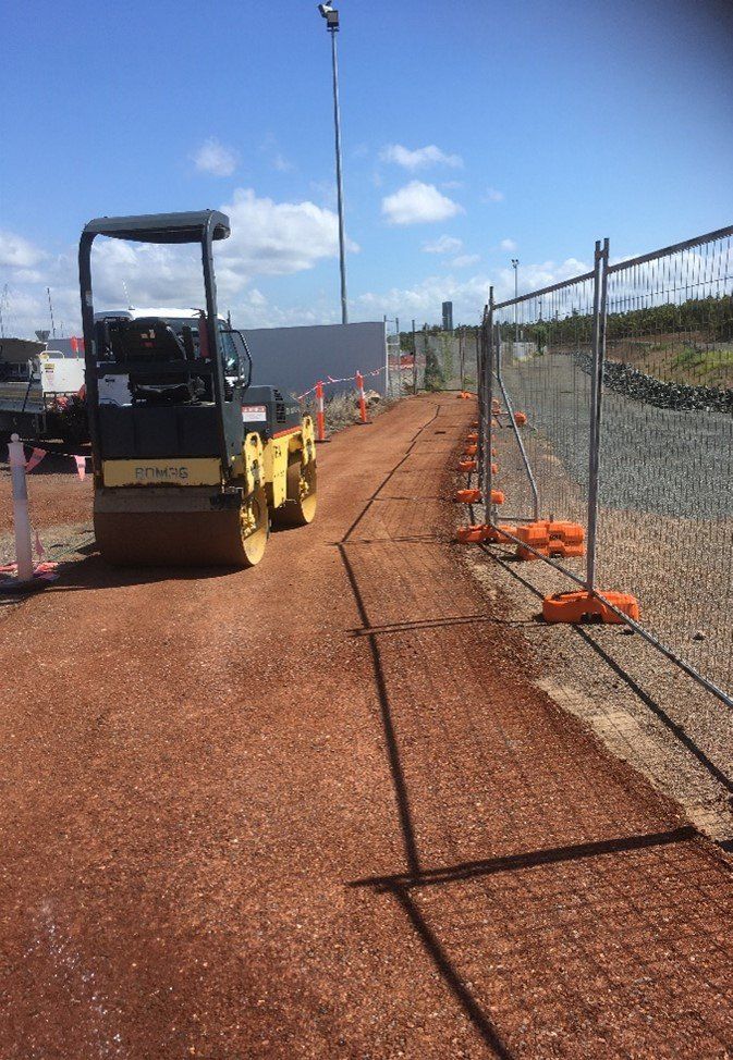 An Large roller on job site — Civil Construction in Gladstone Region, QLD