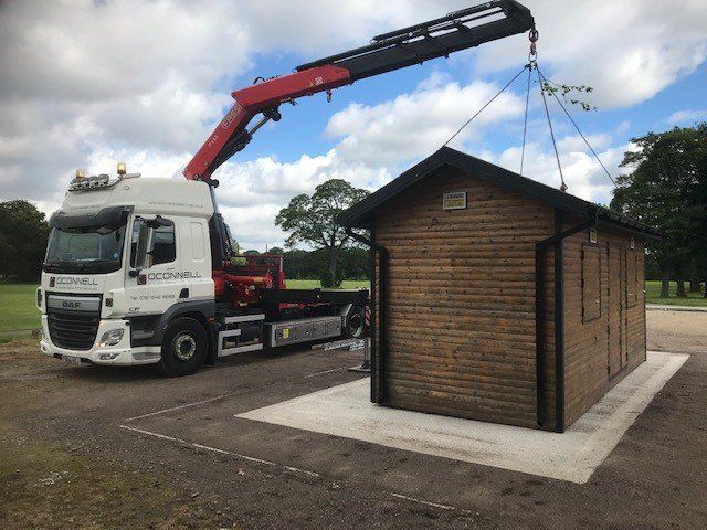 oconnell site services installing new bike shed for Sherdley Park in St. Helens