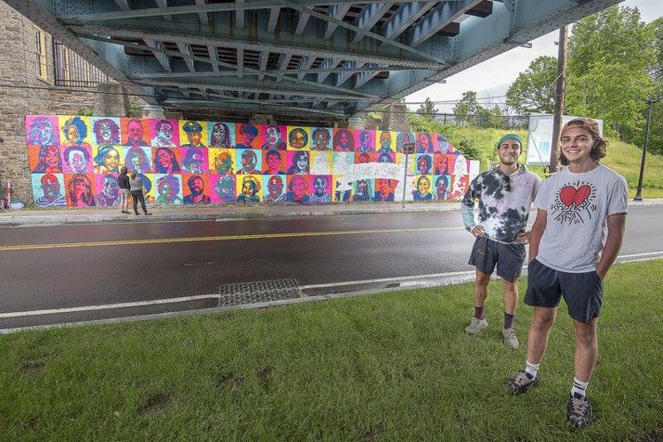 Take a smile, leave a smile at latest Falls mural