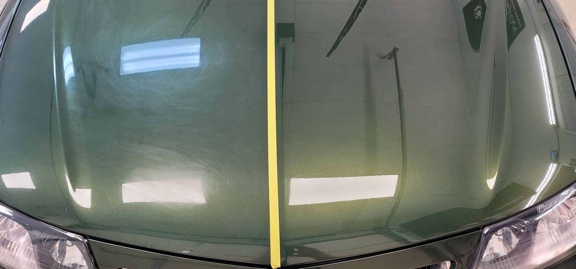 The hood of a car is shown before and after being cleaned.