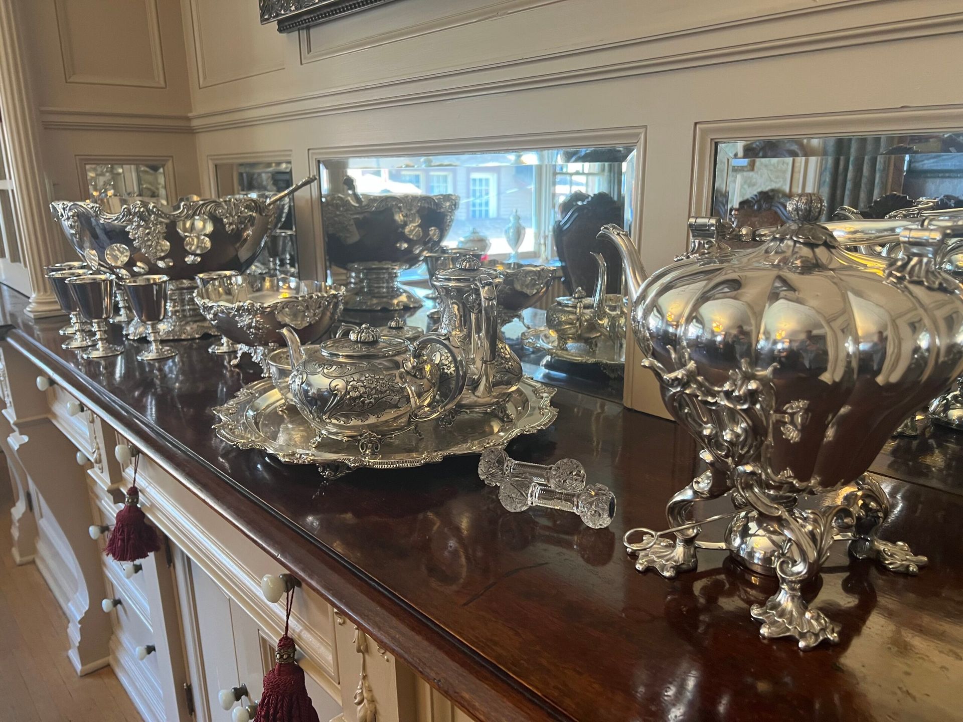 A table with a lot of silverware on it