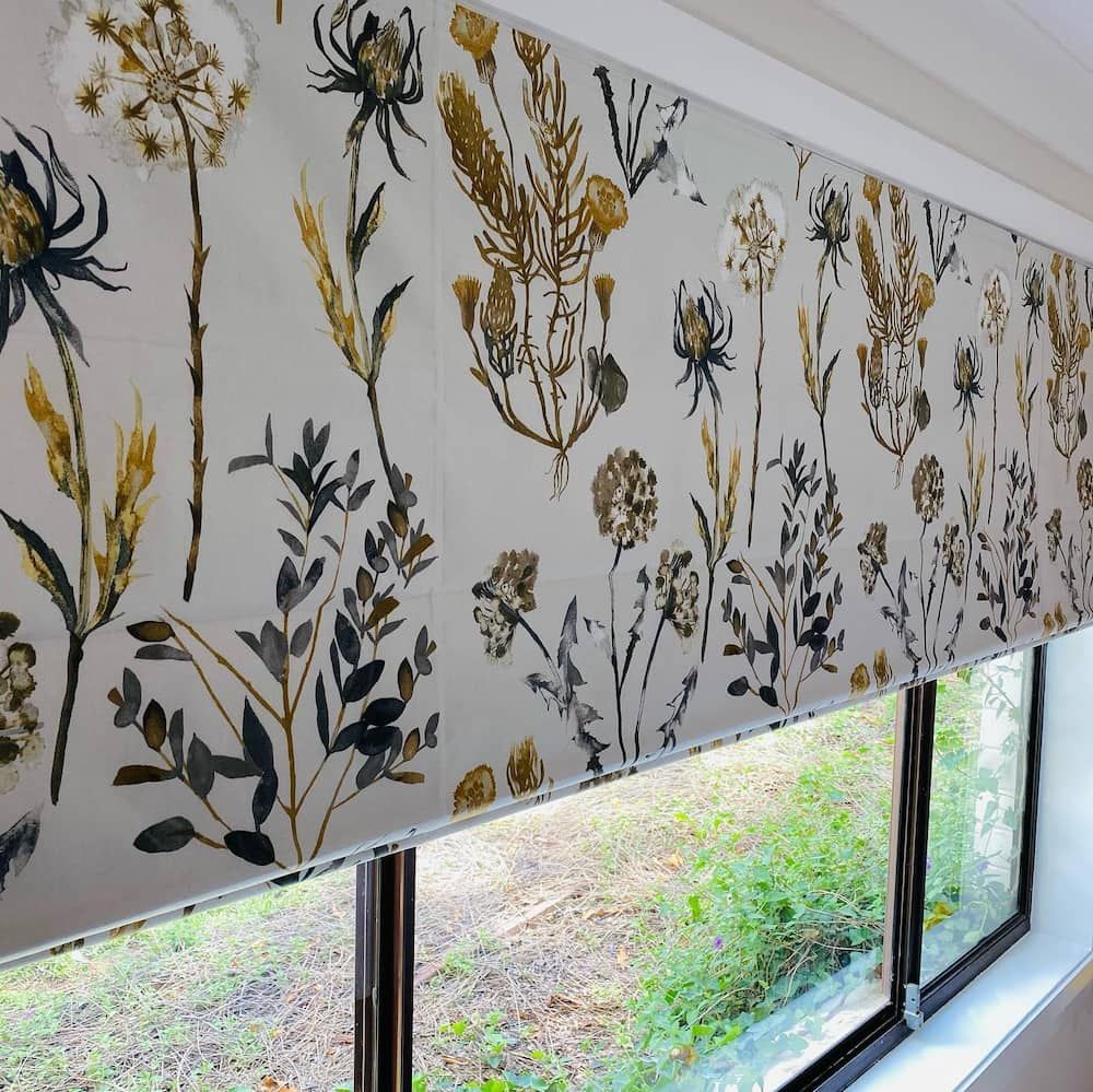 A Window With a Blind With Flowers on It — Tamworth Interiors in Tamworth, NSW