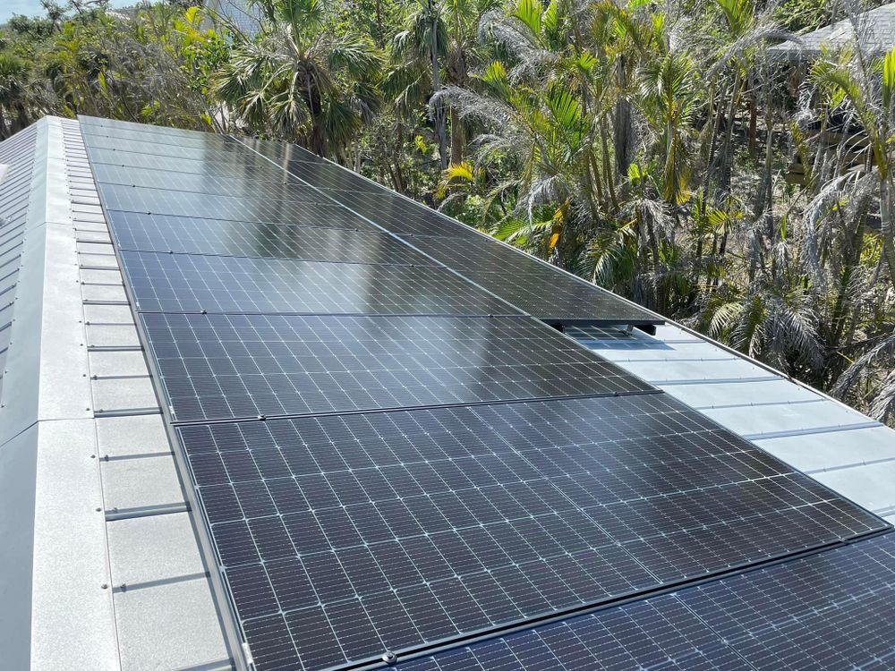 A roof with a lot of solar panels on it
